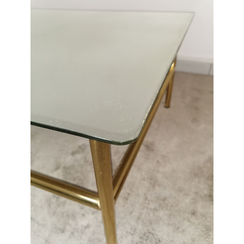 Table basse vintage en verre miroir et métal doré 1980