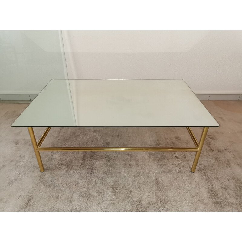 Table basse vintage en verre miroir et métal doré 1980