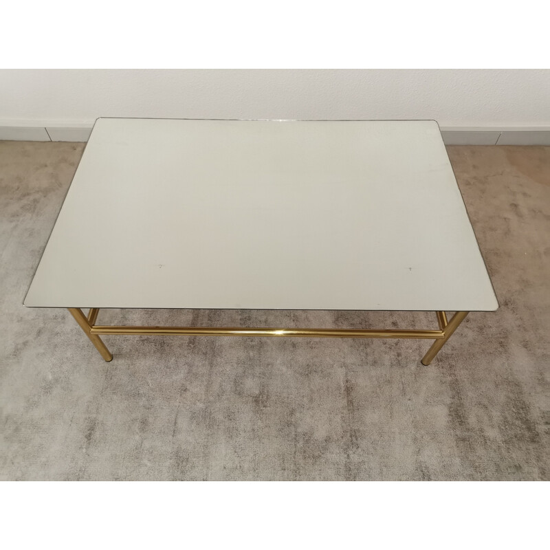 Vintage coffee table in mirror glass and gilded metal 1980