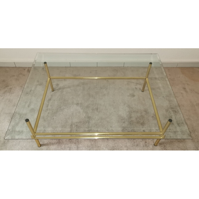 Table basse vintage en verre et métal doré 1980