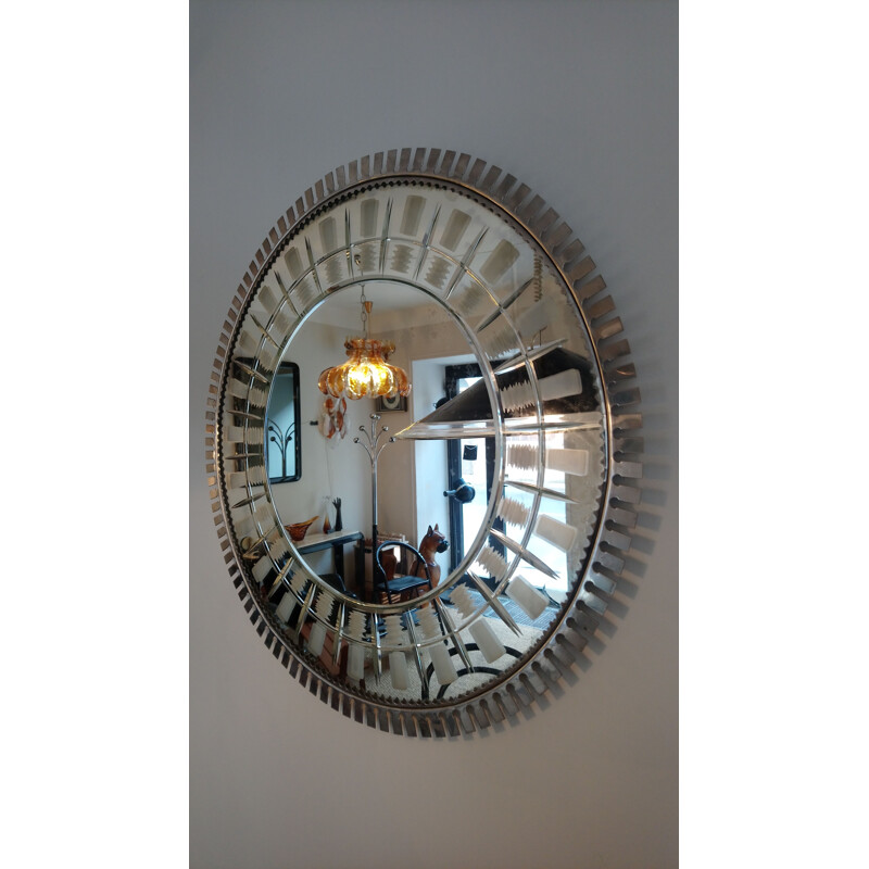 Large vintage mirror in chiselled and bevelled metal 1960