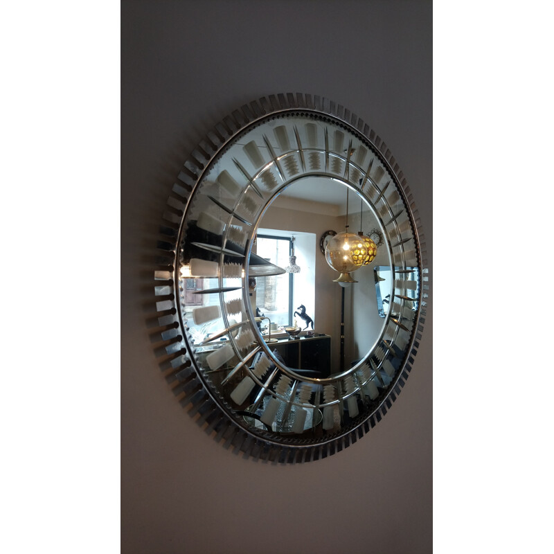 Large vintage mirror in chiselled and bevelled metal 1960