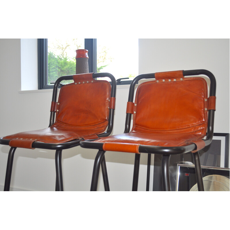 Vintage pair of leather stools