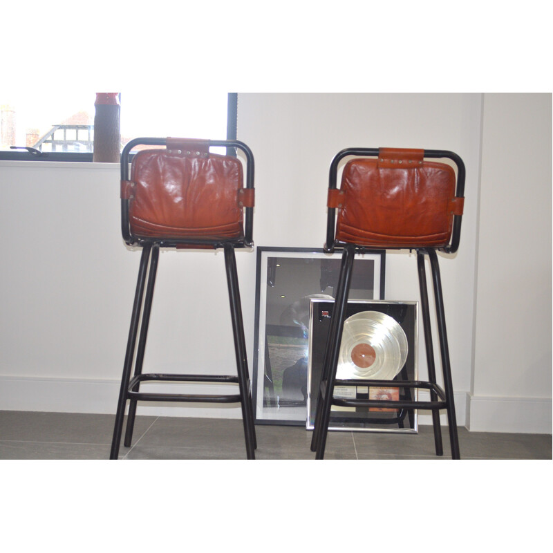 Vintage pair of leather stools