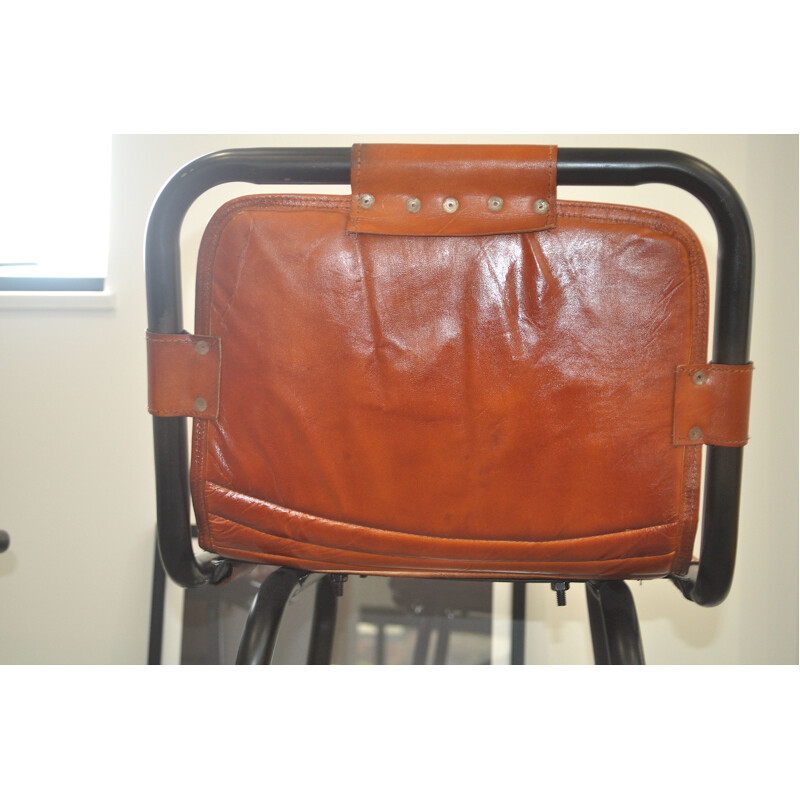 Vintage pair of leather stools