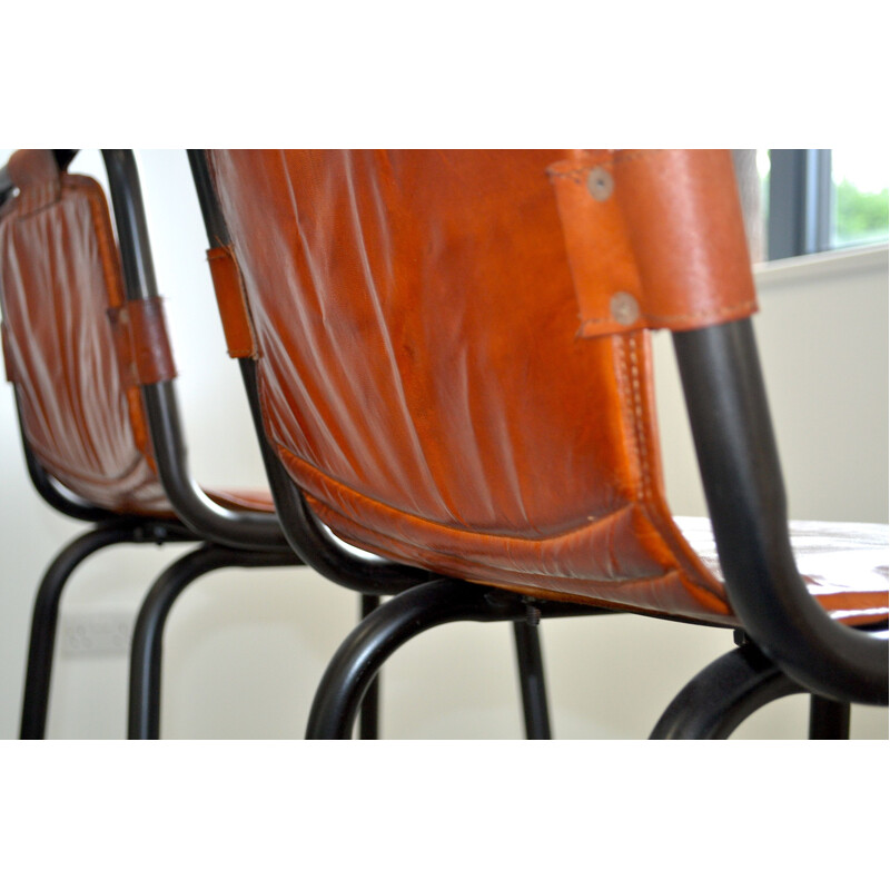 Vintage pair of leather stools