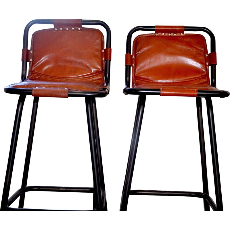 Vintage pair of leather stools