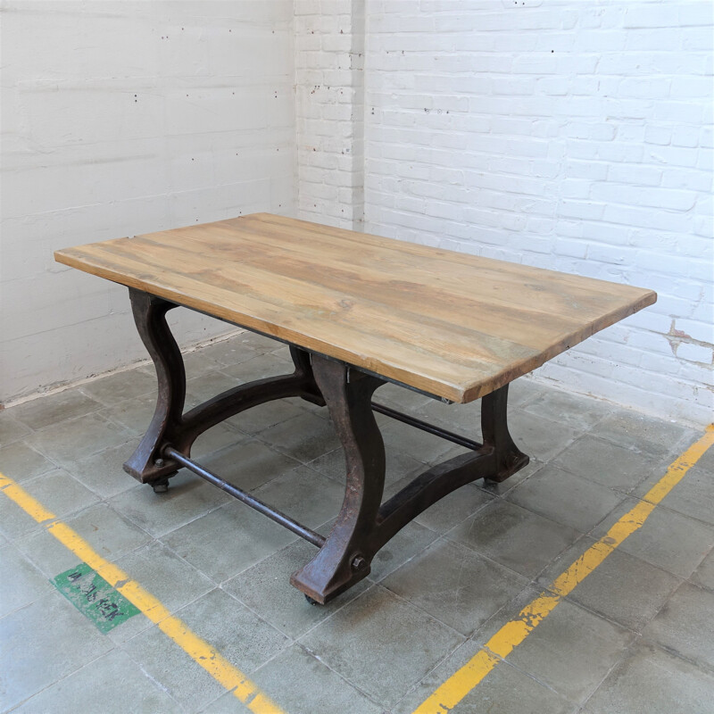 Vintage Industrial cast iron table on wheels