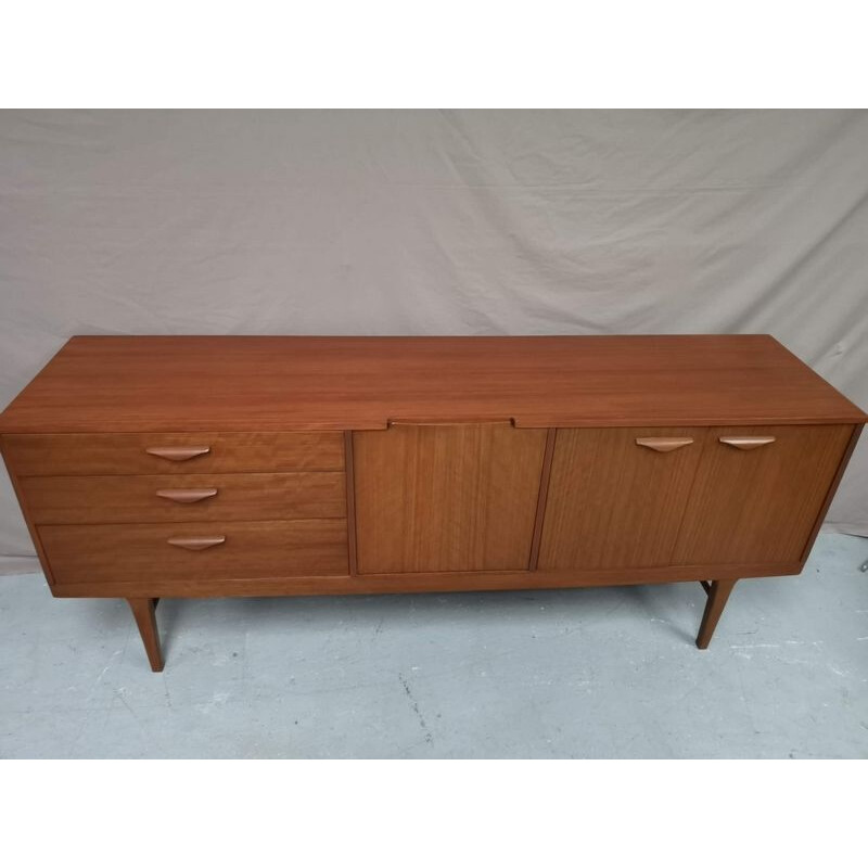 Vintage teak sideboard and spindle foot