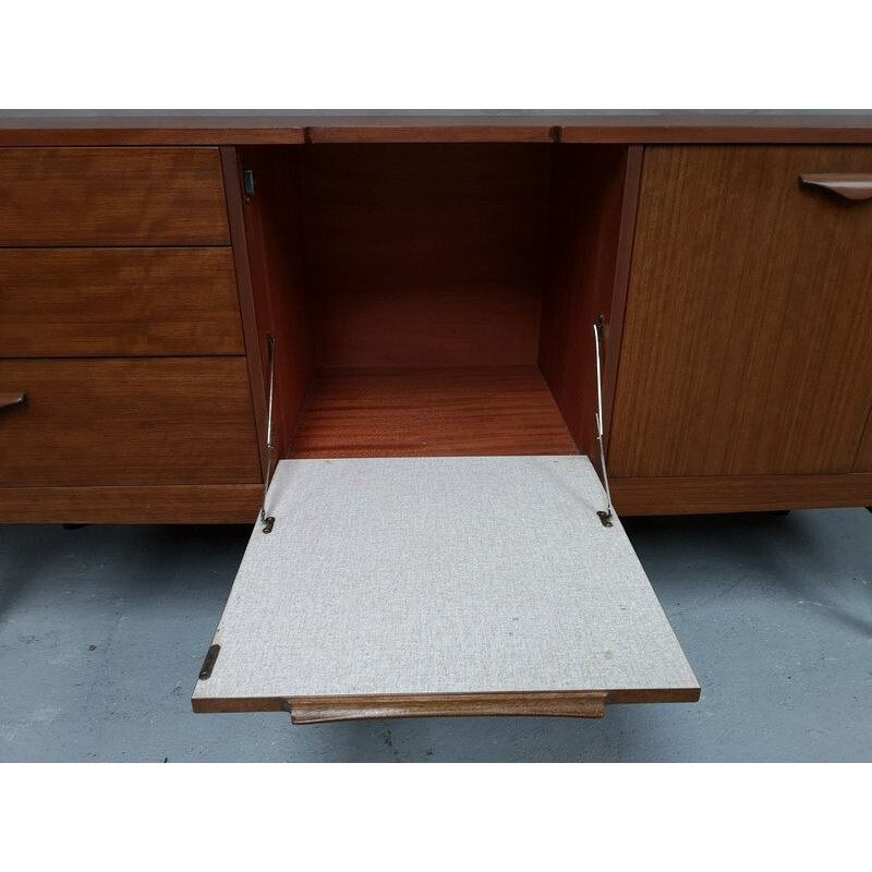 Vintage teak sideboard and spindle foot