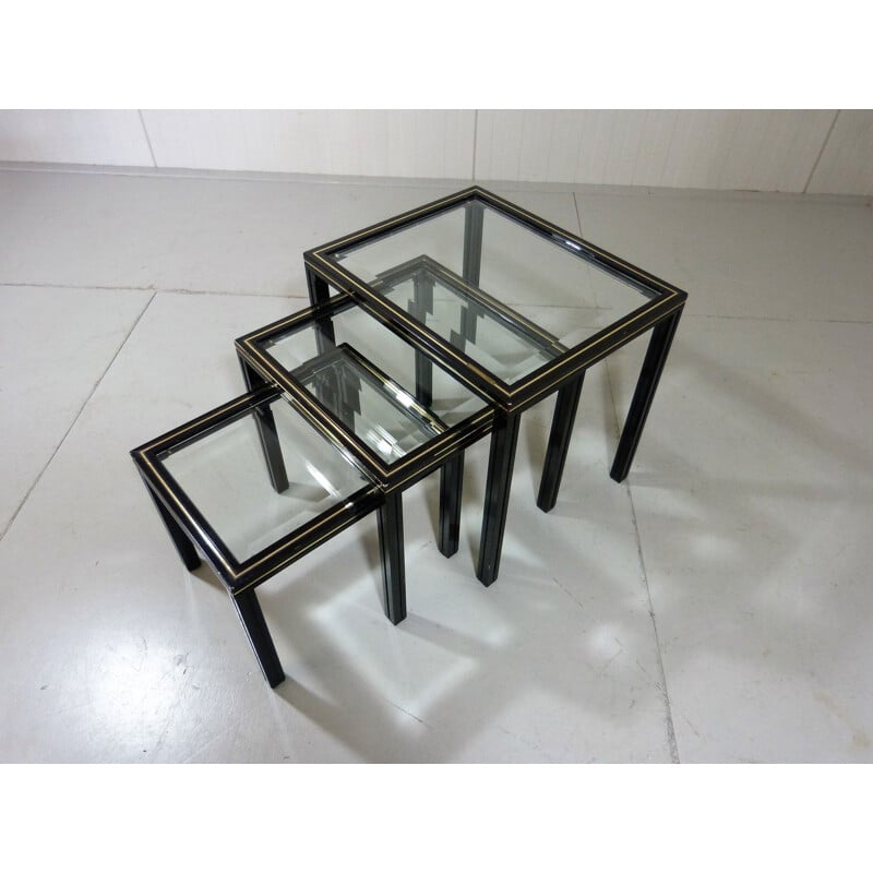 Vintage nesting tables in glass and black and brass fame by Pierre Vandel, France