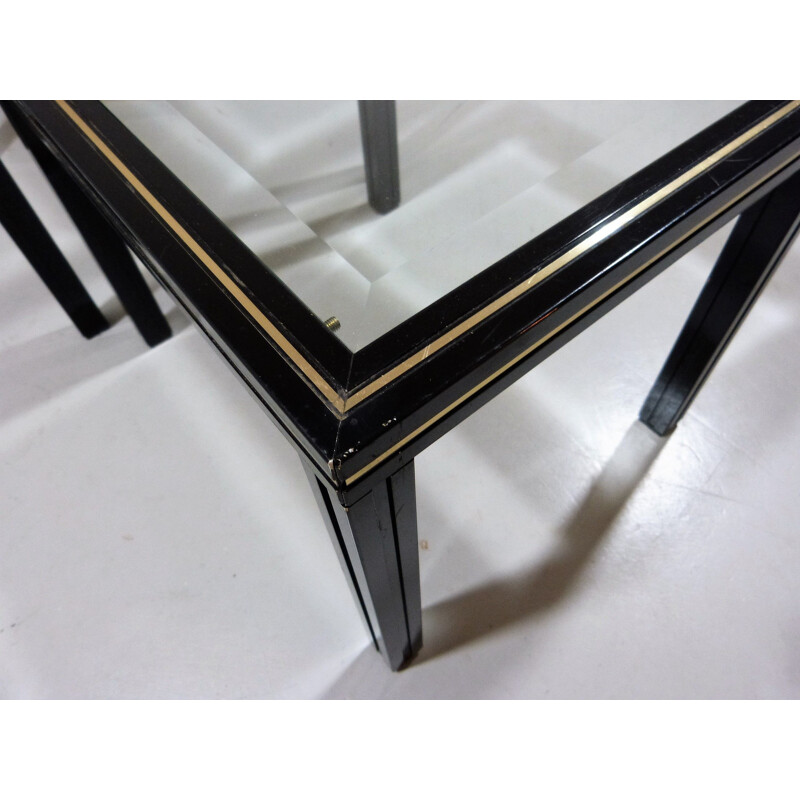 Vintage nesting tables in glass and black and brass fame by Pierre Vandel, France