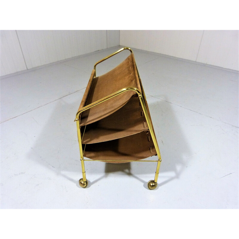 Vintage suede & brass magazine holder on wheels