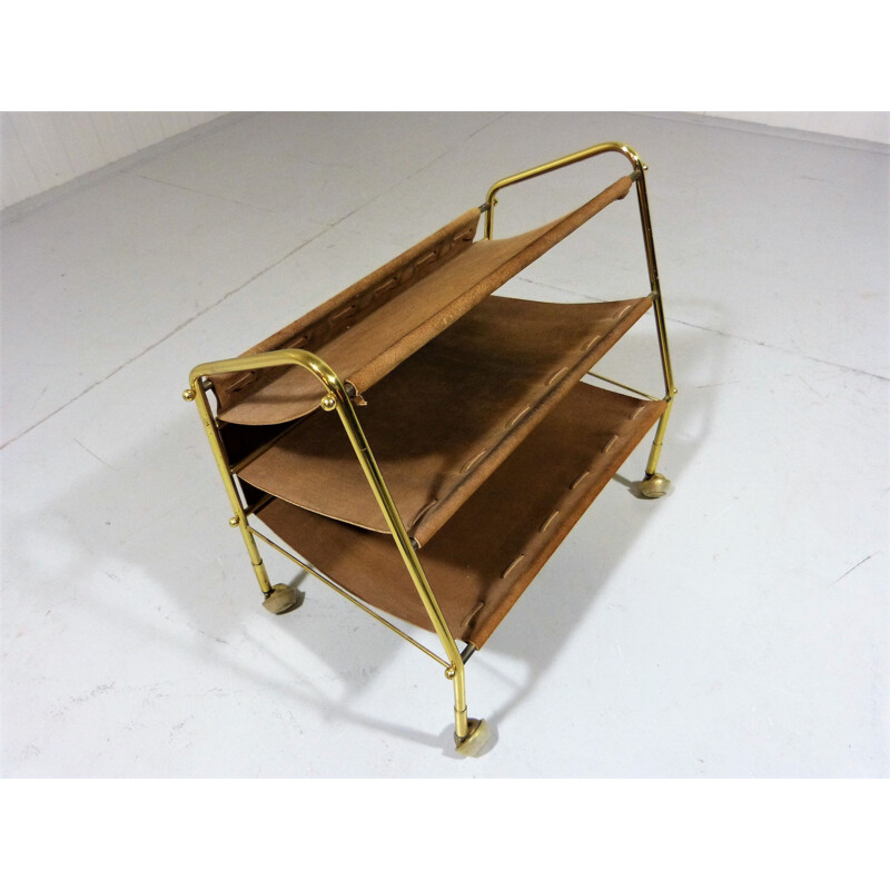 Vintage suede & brass magazine holder on wheels