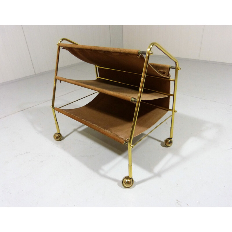 Vintage suede & brass magazine holder on wheels