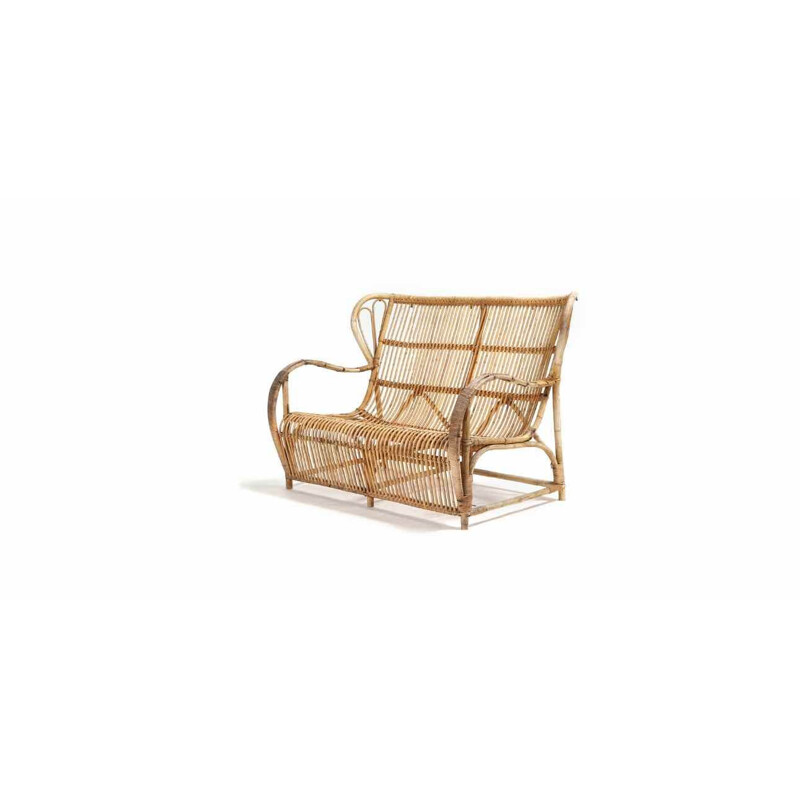 A vintage moulded bamboo sofa by R. Wengler