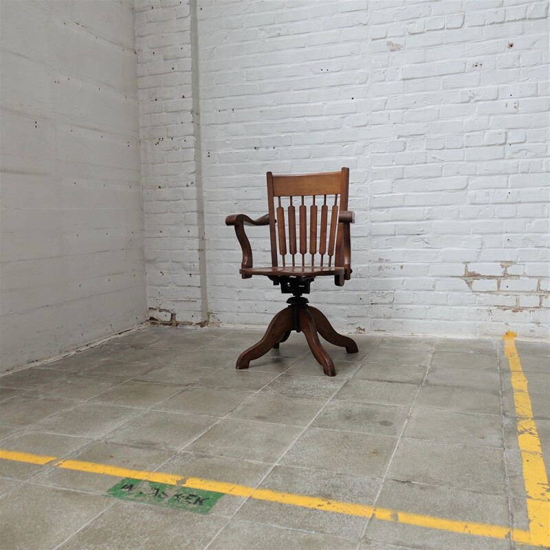 Vintage captain's chair in oak wood, England