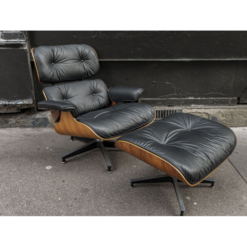 Vintage armchair and ottoman by Eames, Herman Miller publisher, 1990s