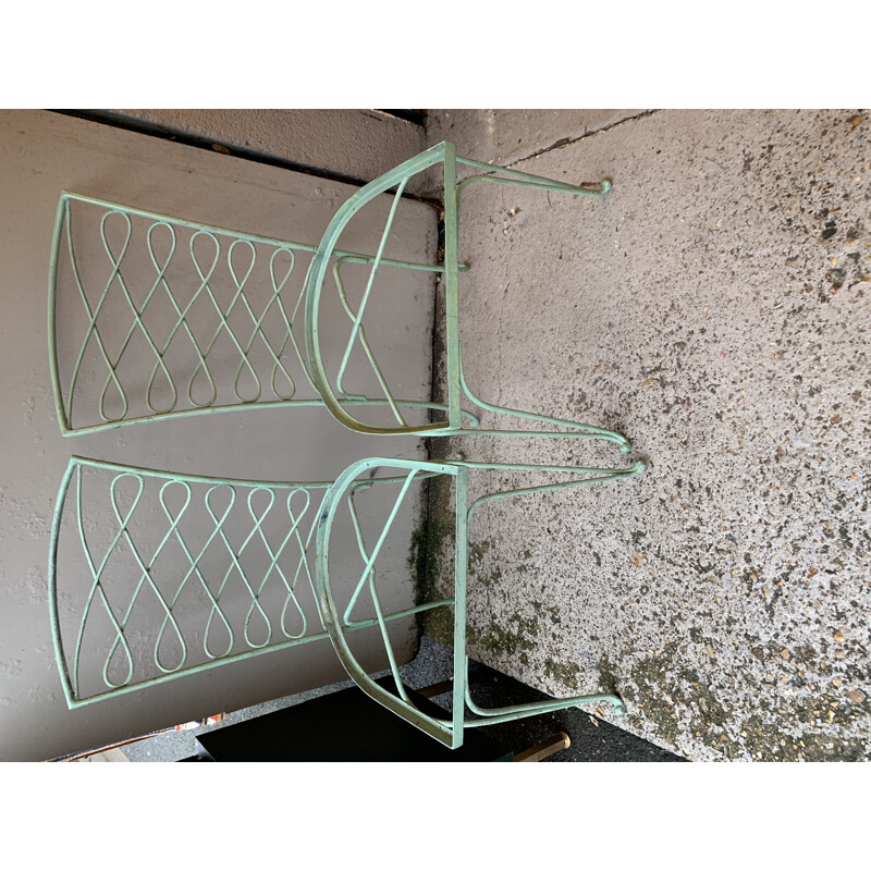 Pair of vintage green lacquered metal chairs by René Prou